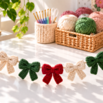 Red cream and green crochet bow garland on a bright white craft table